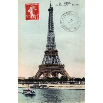 La Tour Eiffel à côté de la Seine à Paris. Timbre avec le cachet de la poste de 1909