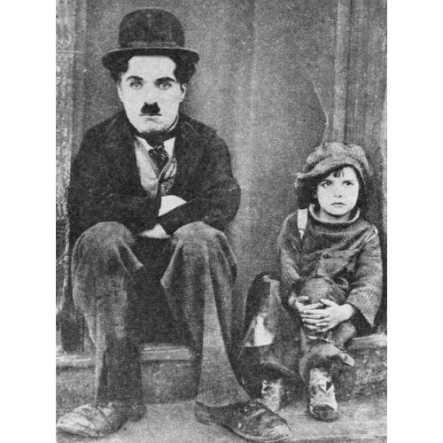 Charlie Chaplin et Jackie Coogan dans The Kid